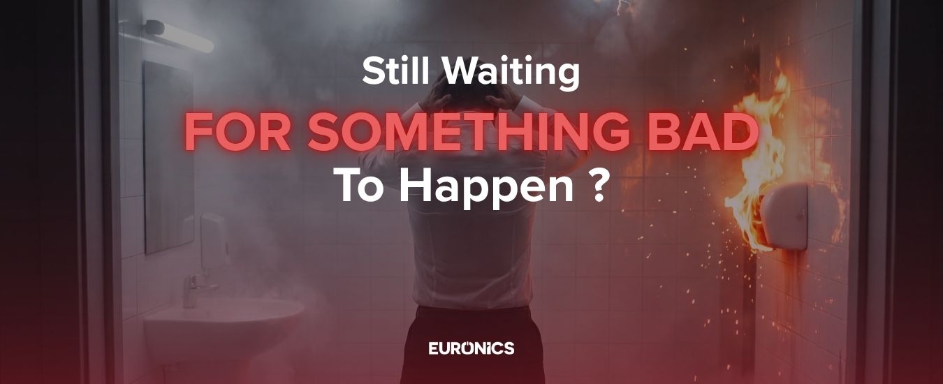 Image of Man in bathroom with fire and smoke, Euronics safety ad