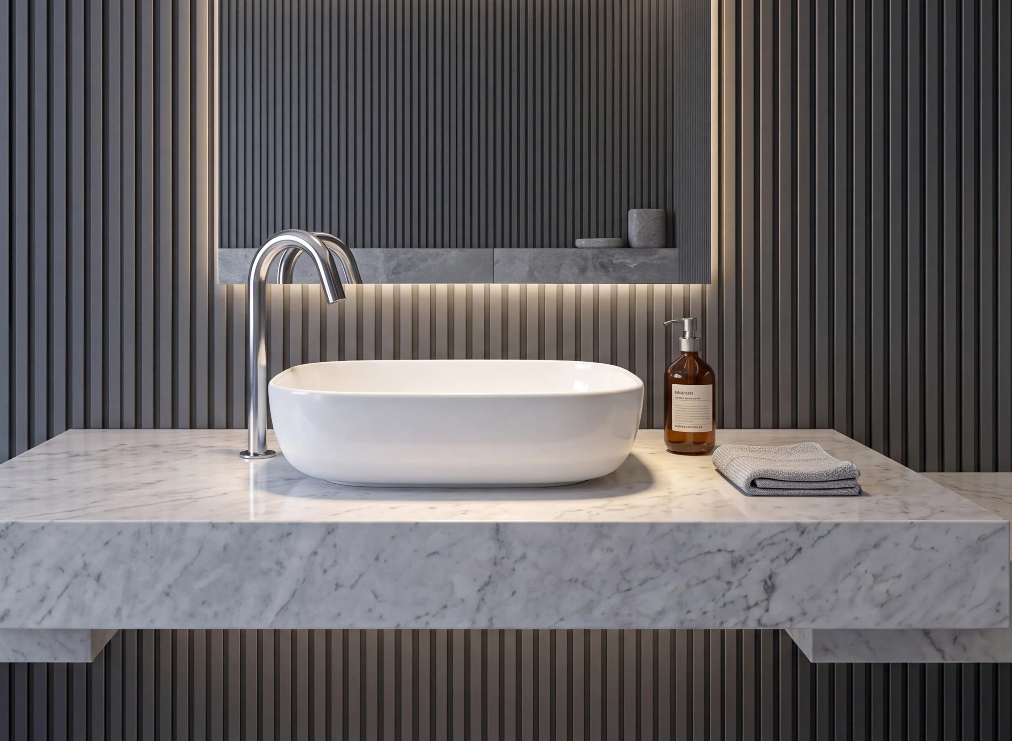 Image of Modern white vessel sink with a chrome faucet on a white marble countertop